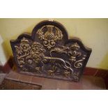 An antique cast iron fire back, bearing date 1641, 67 x 75cm.