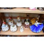 A small collection of Royal Doulton figures, to include Bunnykins musical examples.