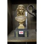 A gilt metal bust of a classical lady,Â on slate base, total height 24cm.