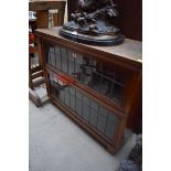 A Globe-Wernicke mahogany and leaded glass two tier sectional bookcase,Â 90.5cm wide.