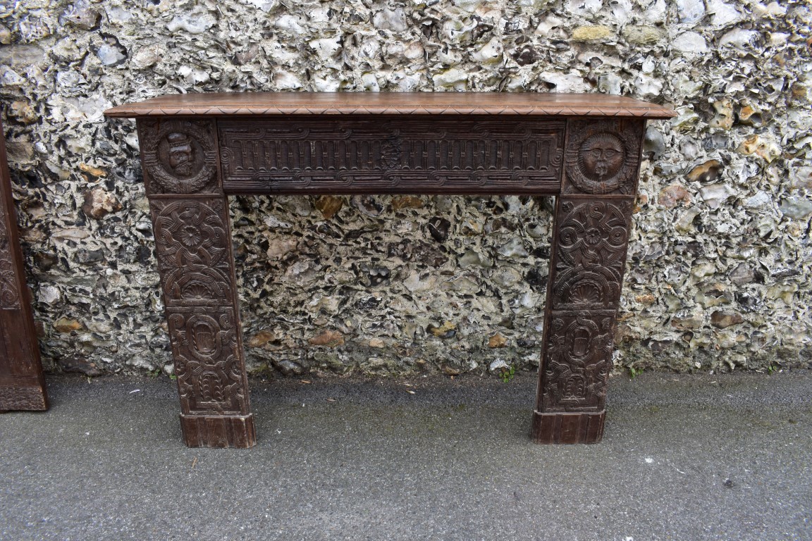 An interesting French carved oak fire surround, containing 16th/17th century elements, the frieze - Image 3 of 3