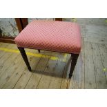 A pair of antique mahogany and upholstered stools.