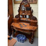 A Victorian burr walnut duchess dressing table, 126cm wide.