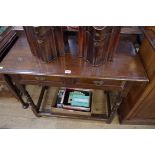 An antique oak single drawer side table,Â 94cm wide.Â