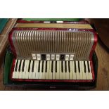 A Hohner piano-accordion, in box.