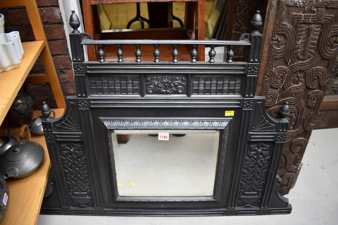 A Victorian aesthetic cast iron overmantel mirror, 94cm wide.