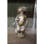 A bronze figure of a young fawn, 17cm high.