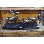 An Art Deco bronzed spelter and slate figure group of three deer, 62cm wide.