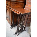 A nest of three mahogany tables, largest 43cm wide.