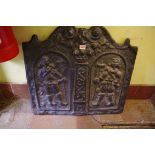 An old cast iron fire back, 58 x 64.5cm.