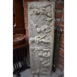 A composition stone relief moulded rectangular friezeÂ panel, 42 x 134cm.