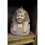 A carved granite bust of an Egyptian Pharaoh, 23cm high.