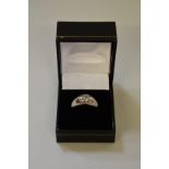 An unmarked solitaire diamond gentlemans ring,Â approximately .75ct.