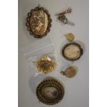 A small quantity of Victorian jewellery to include; an unmarked oval citrine brooch; an oval