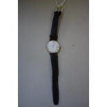 A Geneve 9ct gold gentleman's quartz wristwatch, import mark London 1990, 31mm case, on leather