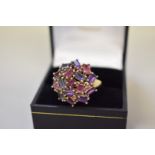 An amethyst cluster gold ring,Â hallmarked 375, 5g all in.