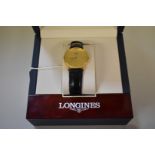 A boxed Longines 18ct gold gentlemans wristwatch, on leather strap
