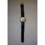 A Benson 9ct gold gentlemans automatic wristwatch, Birmingham 1971, 28mm case, on leather strap.