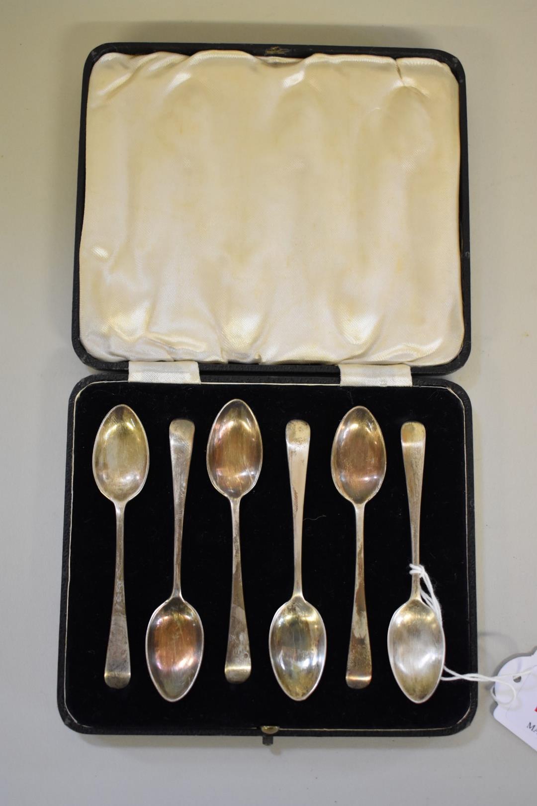 A cased set of six silver teaspoons,Â by Josiah Williams & Co,Â London 1933, 54.5g.