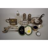 A small collection of silver and metal items, to include:Â a toast rack; a mustard; a fob watch; and