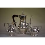 A silver three piece coffee set, by Barker Brothers Ltd, Birmingham 1963, coffee pot 21.5cm high,