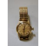 A Rone 9ct gold gentlemans manual wristwatch, cal 1058, 30mm case, hallmark Birmingham 1956, on