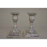 A pair of Victorian silver squat candlesticks,Â by John Round & Son Ltd,Â SheffieldÂ 1895/6, 12cm