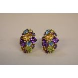 A pair coloured gemstone set gold ear clip/stem earrings,Â hallmarked 375, 7.4g all in.