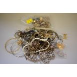 A bag of mixed costume jewellery, to include a pair of Christian Dior earrings.