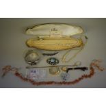 A quantity of costume jewellery, to include a Record ladies wristwatch stamped 9ct.