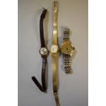 A Tissot PR100 stainless steel and gold plated ladies wristwatch; together with two vintage Tissot