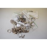 A quantity of silver and metal jewellery.