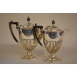 A VictorianÂ silverÂ coffee pot and matching hot water jug, by Roberts & Belk, Sheffield 1899, pot