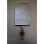 A Bulova Acutron gold plated gentlemans wristwatch, N4 (1974), with papers.
