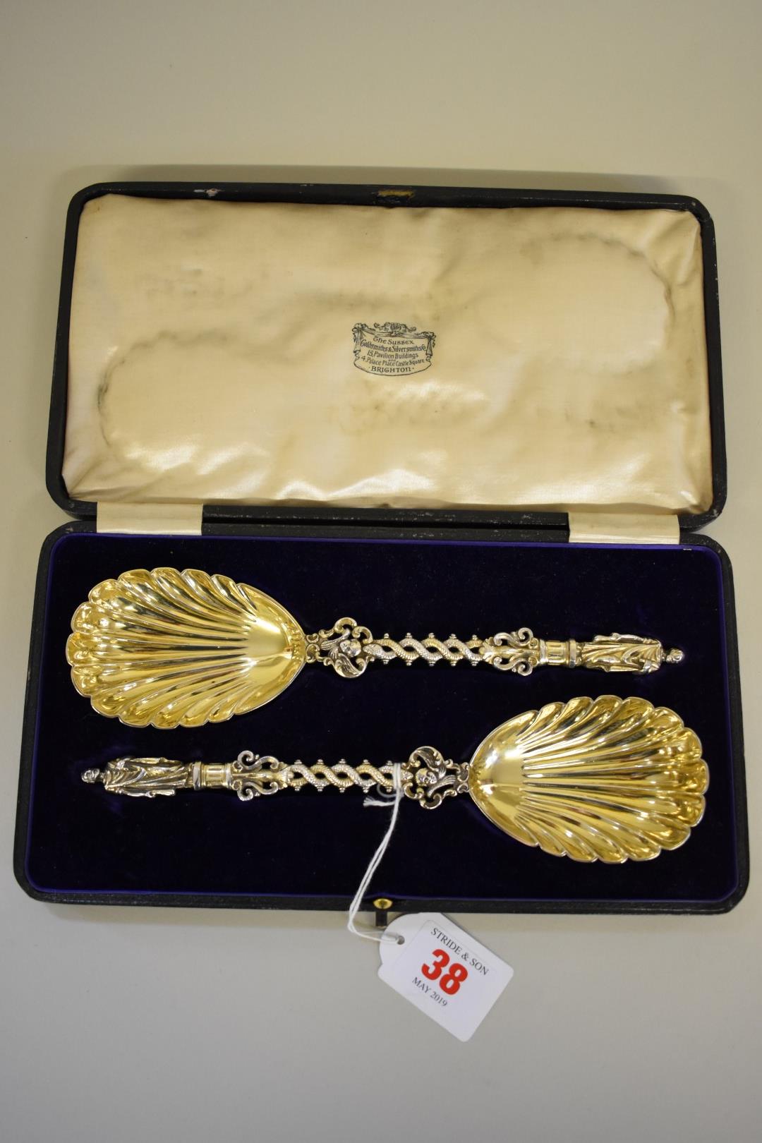 A cased pair of Victorian silver gilt apostle serving spoons,Â byÂ John Aldwinckle & Thomas Slater,Â