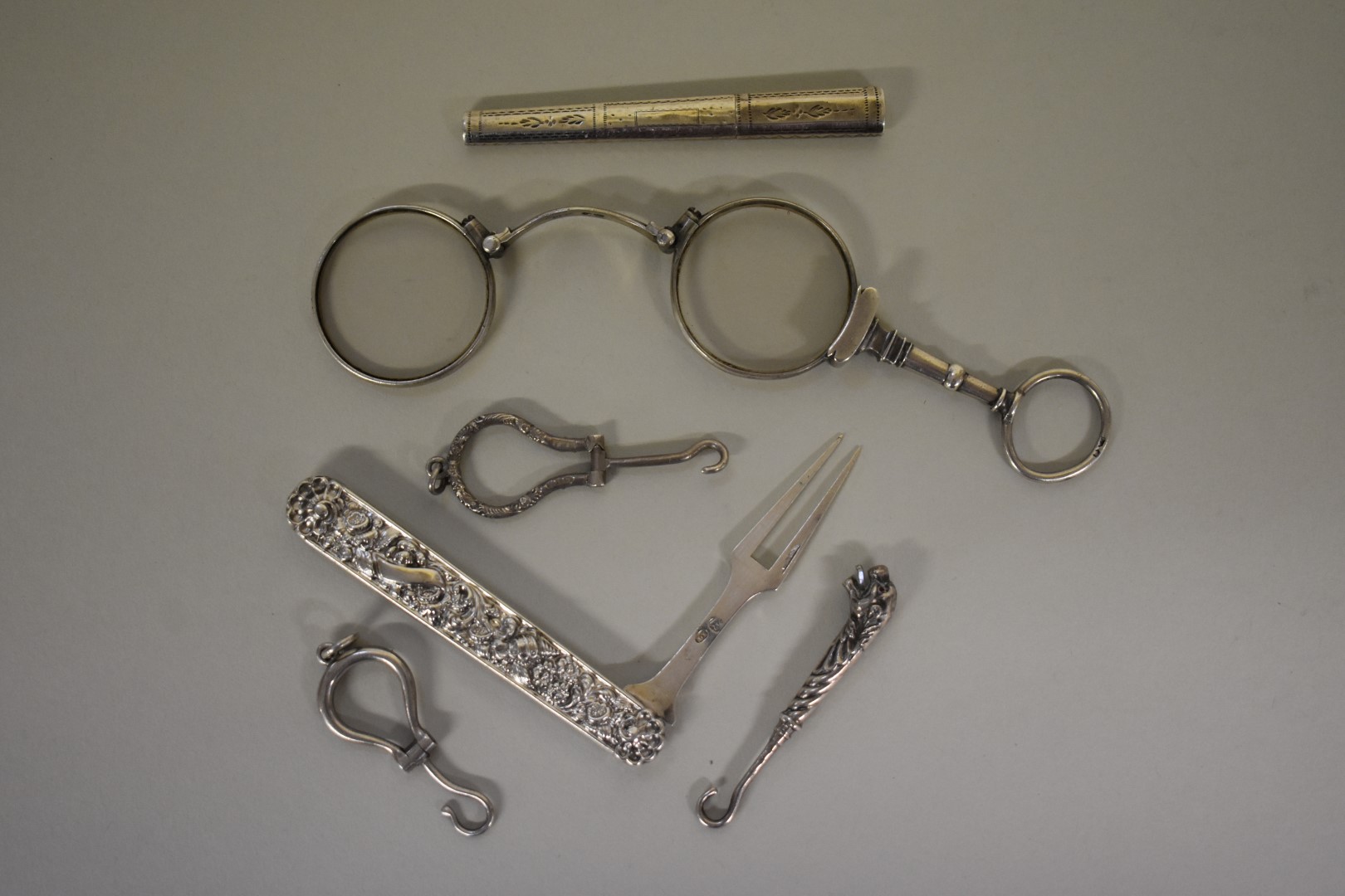 A pair of William IV silver lorgnettes, by Mary Anne Holmes, London 1827; together with a Georgian