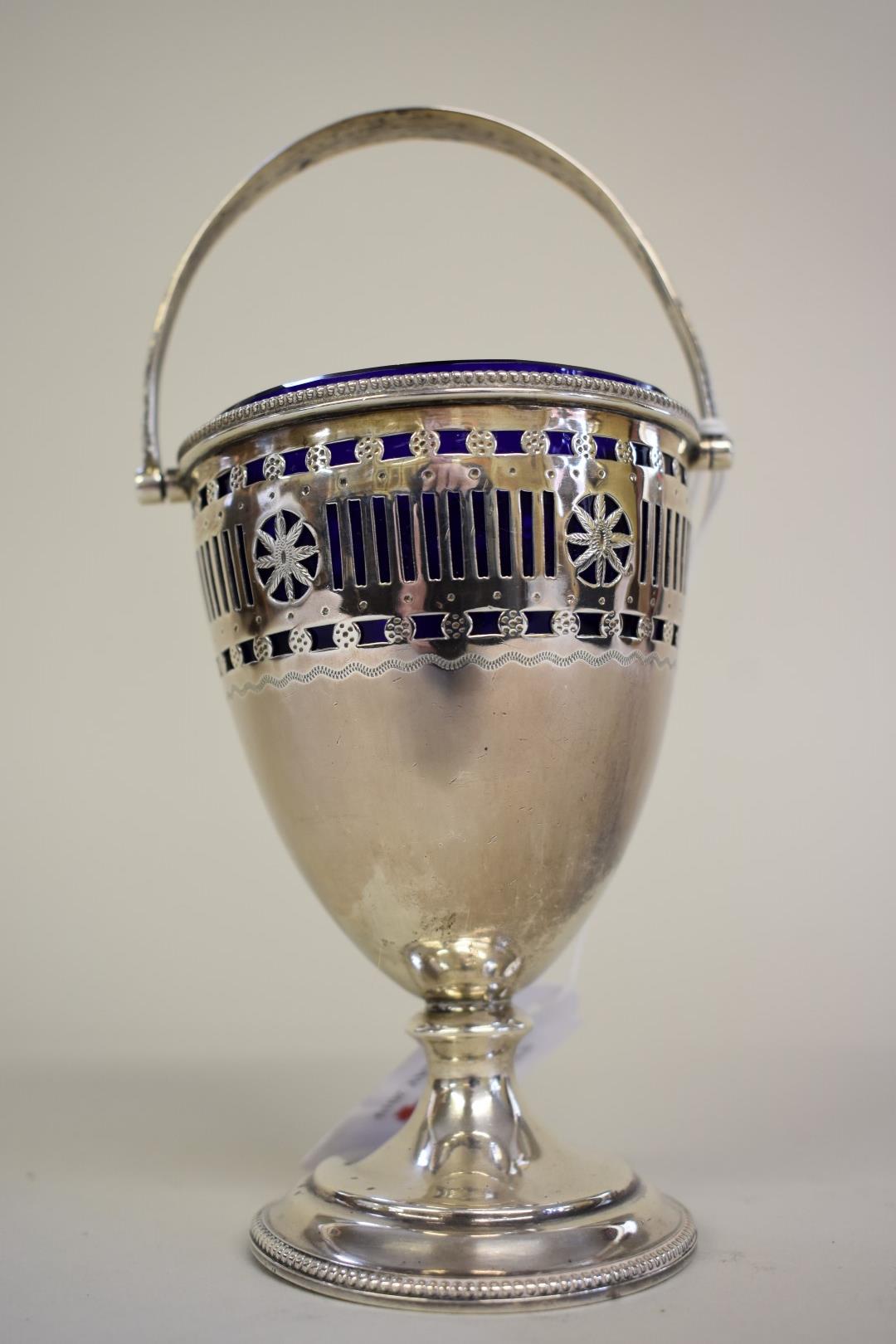 A pierced silver sugar basket,Â by L & W, Birmingham 1911, 11cm high, 99g.