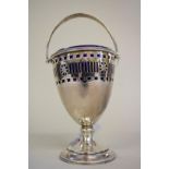 A pierced silver sugar basket,Â by L & W, Birmingham 1911, 11cm high, 99g.