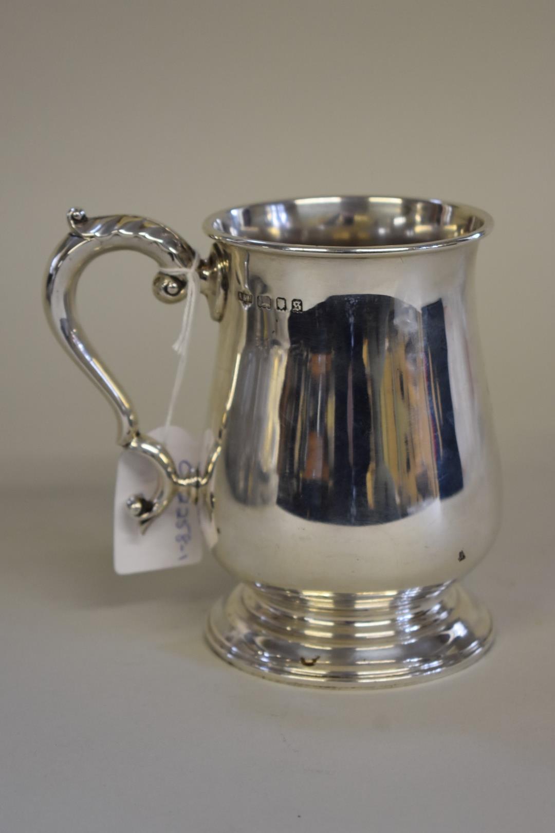 A silver baluster tankard, by Alstons & Hallam,Â London 1933, 12.5cm high, 324g.