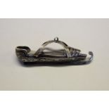 A Russian niello silver 'ice skate' pendant, stamped .84, by F K, St. Petersburg, 6cm.