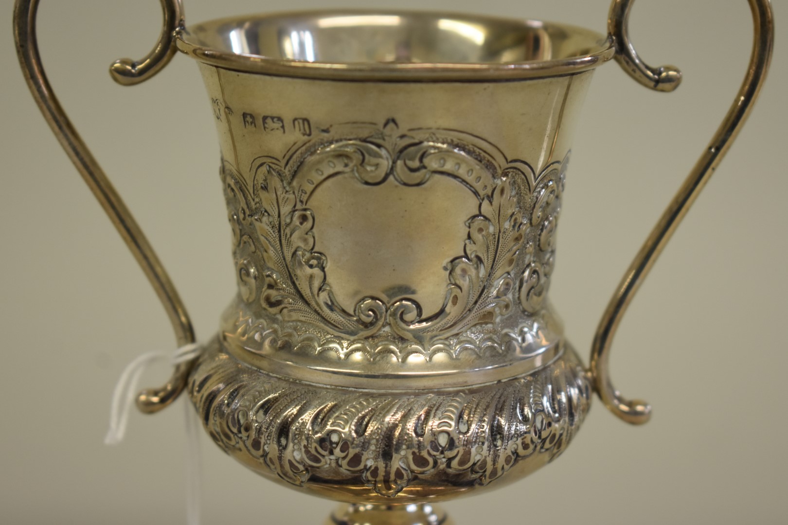 An Edwardian silver twin handled trophy cup, by Joseph Lester Ltd, Birmingham 1910, 13cm high, 101. - Image 2 of 2