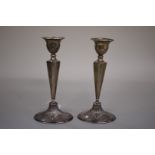 A pair of silver candlesticks,Â by Cornelius Desormeaux Saunders & James Francis Hollings,Â