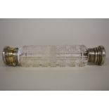 A hobnail cut glass double ended scent bottle, having chased gilt metal ends, 14.5cm.