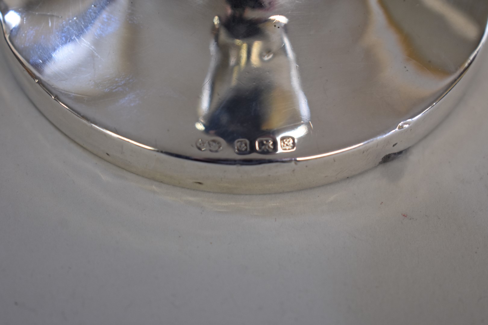 A silver capstan inkwell, by Sanders & Mackenzie, Birmingham 1934, base diameter 8.7cm. - Image 2 of 2