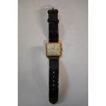 A 1960s Sarcar 18k gold wristwatch,Â on black lizard strap, manual wind, case no. 490914, 29 x 26mm.