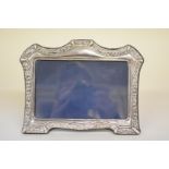 A silver easel photograph frame, by R B B, Sheffield 1991, 18.5cm x 14.5cm.