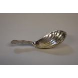 A Georgian bright cut silver shell caddy spoon, by Solomon Hougham, London 1797, 8cm, 9g.