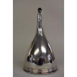 A George lll silver wine funnel, marks rubbed, London 1799, 14cm, 119.5g.