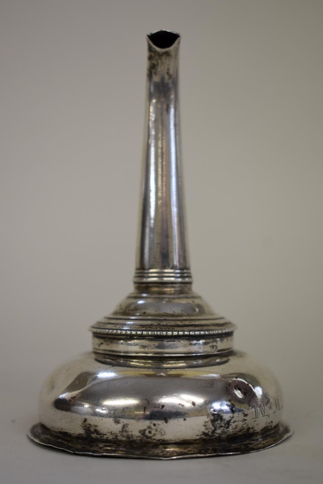 A George III silver wine funnel, marks rubbed Hester Bateman, London 1777, 12cm long.