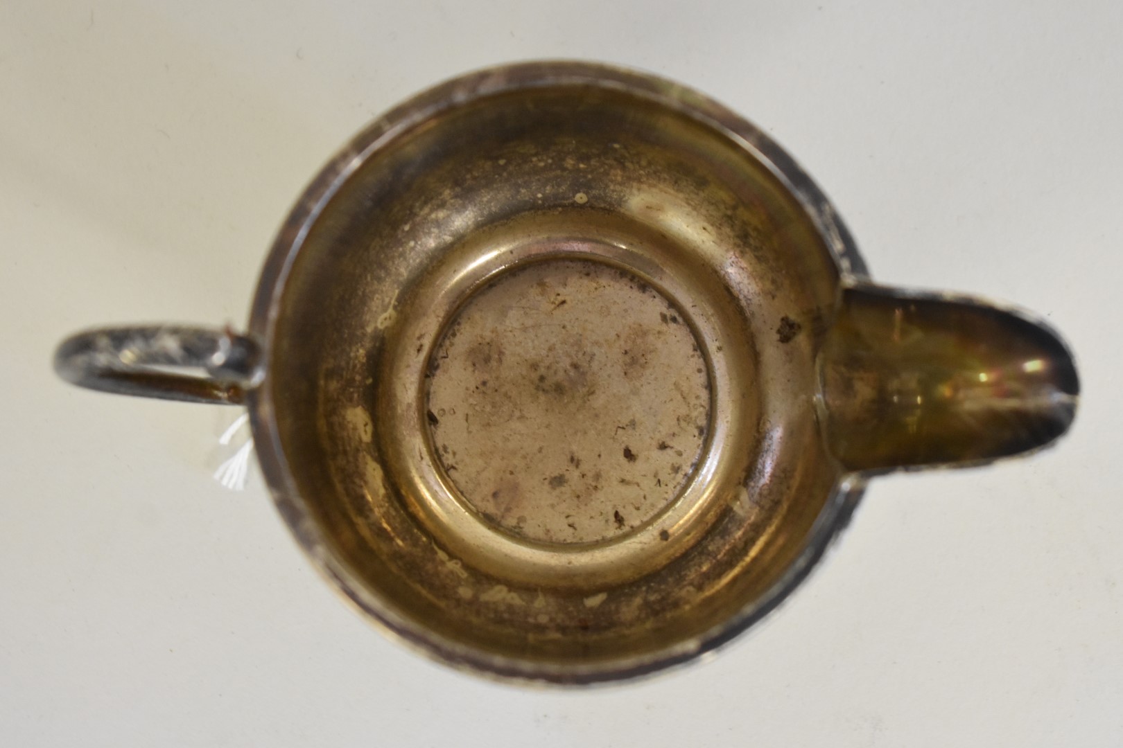 A silver cream jug, by Aaron Lufkin & Dennison, Birmingham 1939, 6cm, 79g. - Image 3 of 3